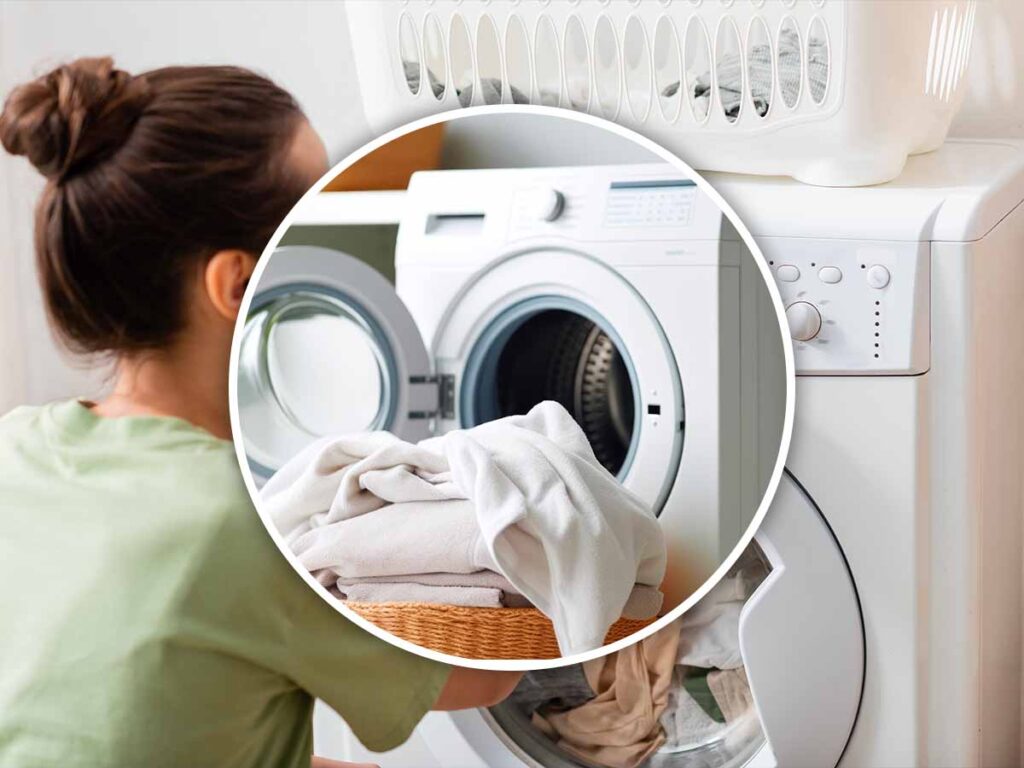 cestello della lavatrice aperto con un cesto di bucato davanti